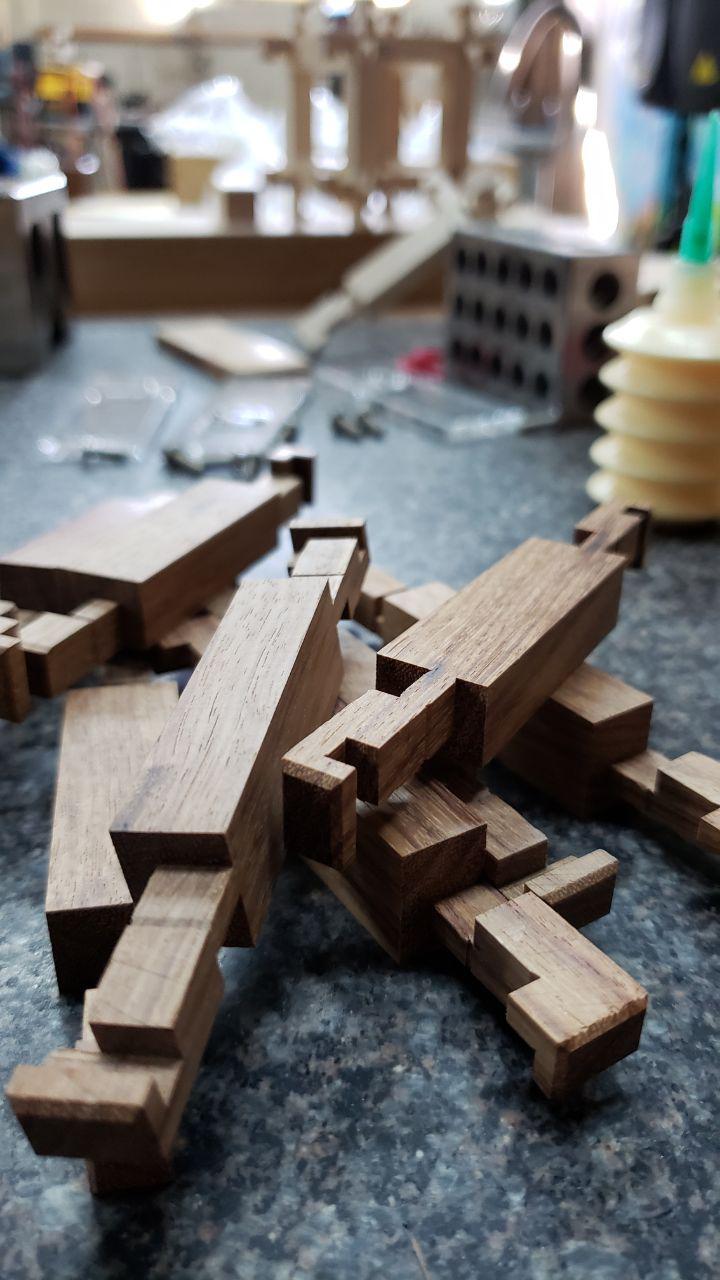 New mechanical interlocking packing puzzles and puzzle boxes