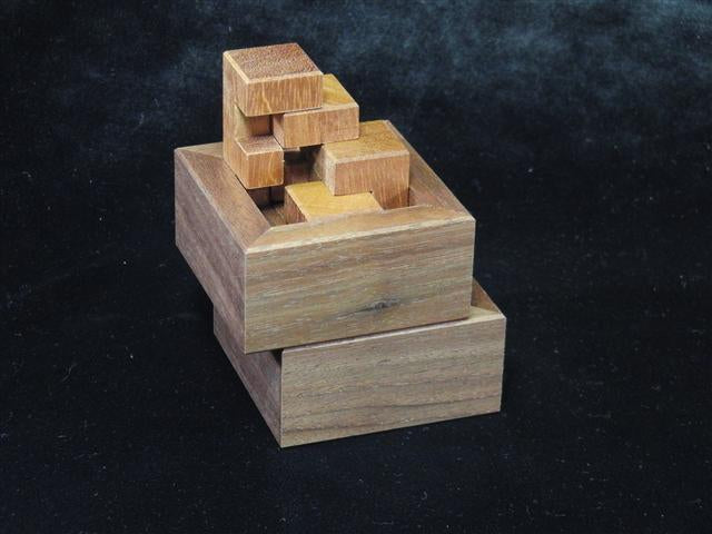 Puzzle boxes, mechanical puzzles, and puzzle games for adults by CubicDissection.