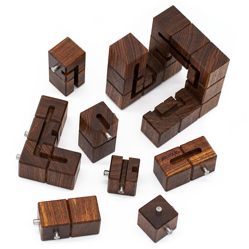 Puzzle boxes, mechanical puzzles, and puzzle games for adults by CubicDissection.