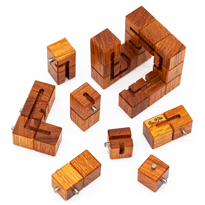 Puzzle boxes, mechanical puzzles, and puzzle games for adults by CubicDissection.