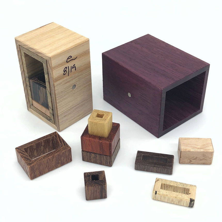 Wooden puzzle boxes, puzzle boxes for adults and escape room puzzles by CubicDissection.