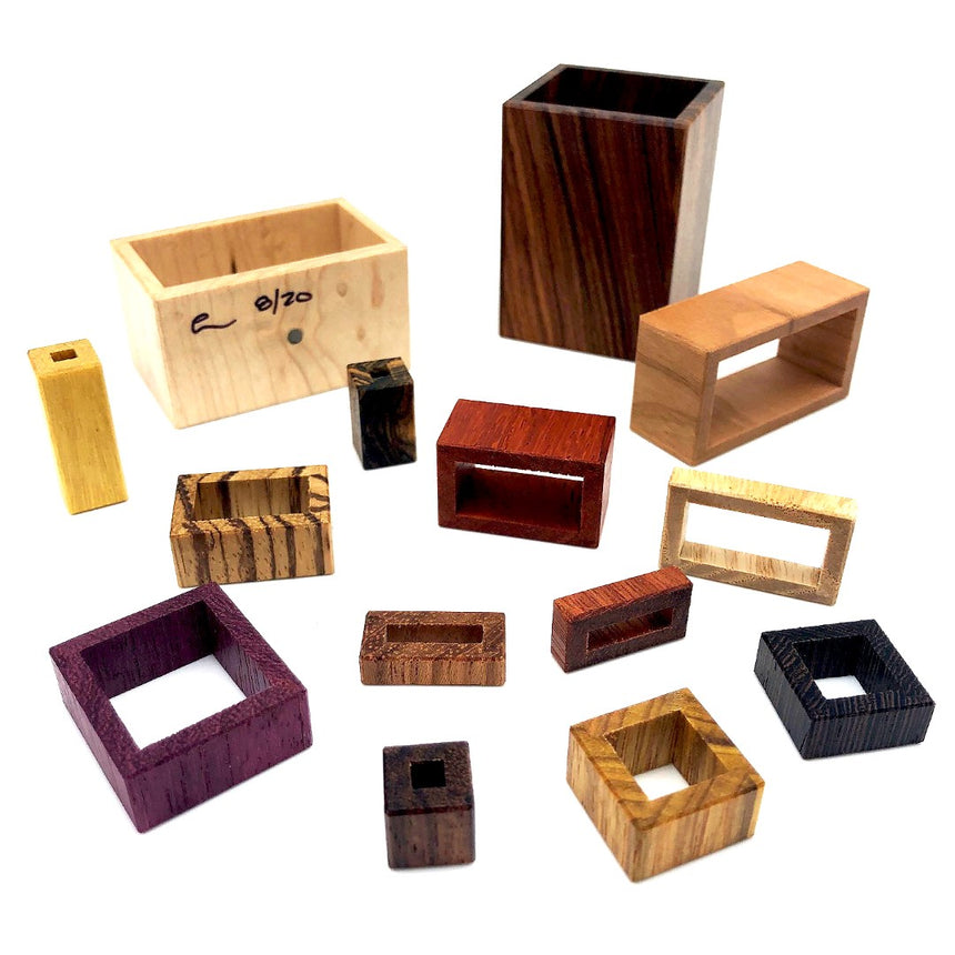 Burr puzzles, interlocking wood puzzles, and puzzles for adults by CubicDissection.