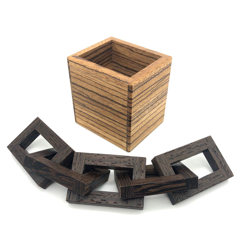 Puzzle boxes, mechanical puzzles, and puzzle games for adults by CubicDissection.