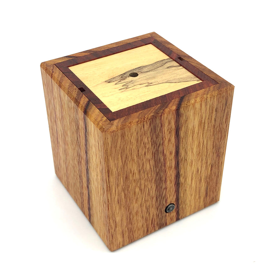 Puzzle boxes, mechanical puzzles, and puzzle games for adults by CubicDissection.