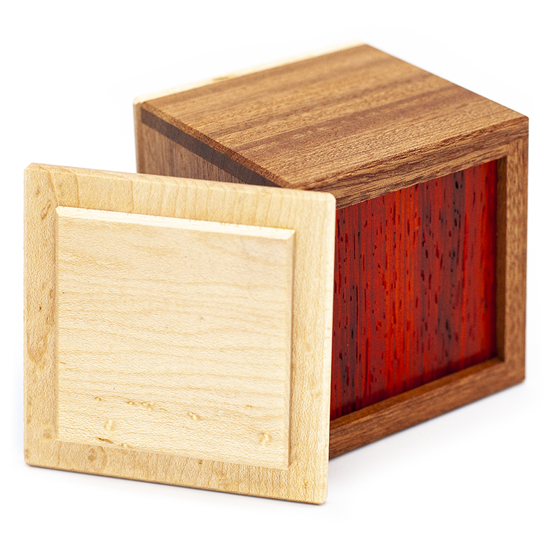 Puzzle boxes, mechanical puzzles, and puzzle games for adults by CubicDissection.