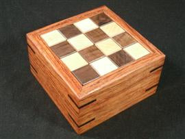 Puzzle boxes, mechanical puzzles, and puzzle games for adults by CubicDissection.