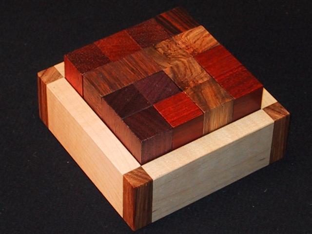 Puzzle boxes, mechanical puzzles, and puzzle games for adults by CubicDissection.