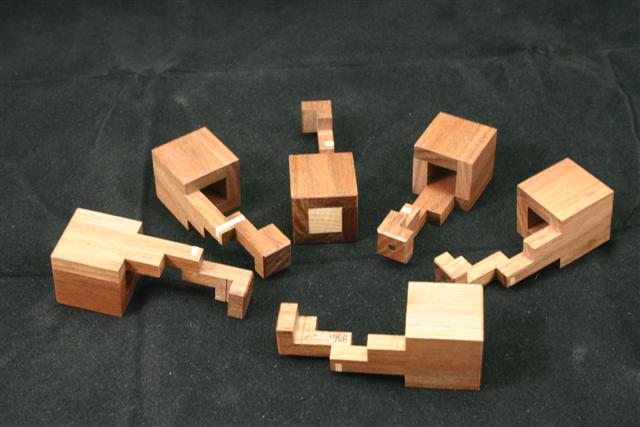 Wooden puzzle boxes, puzzle boxes for adults and escape room puzzles by CubicDissection.